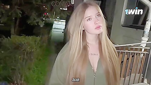 Sexy blonde model shows off her legs and pussy